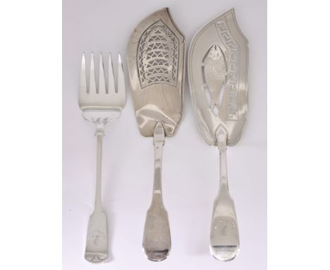 Two George III Silver Fiddle Pattern Fish Slices and a Plated Fish Fork, one by John Shekleton, London 1807, the blade pierce