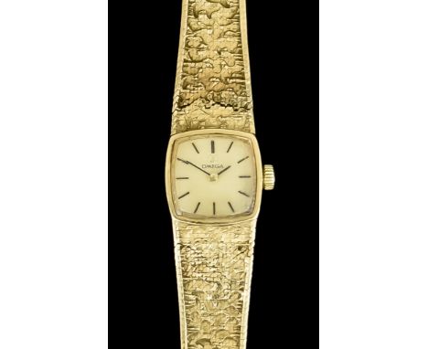 A 9ct Gold Lady's Manual Wind Cocktail Watch, by Omega, square case,&nbsp;16mm, champagne coloured dial with gold baton numer
