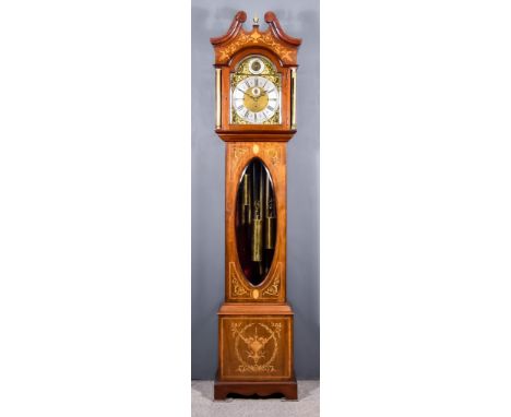 An Edwardian Mahogany Longcase Clock, the 12.5ins arched brass dial with wide silver chapter ring with Roman and Arabic numer