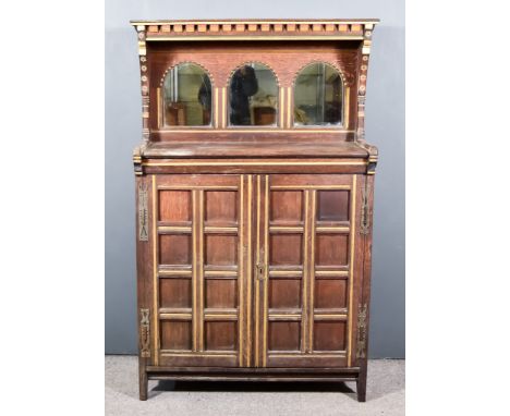 A Victorian Aesthetic Movement Oak and Parcel Gilt Chiffonnier, designed by A.W. Blomfield, with moulded cornice, dentil frie