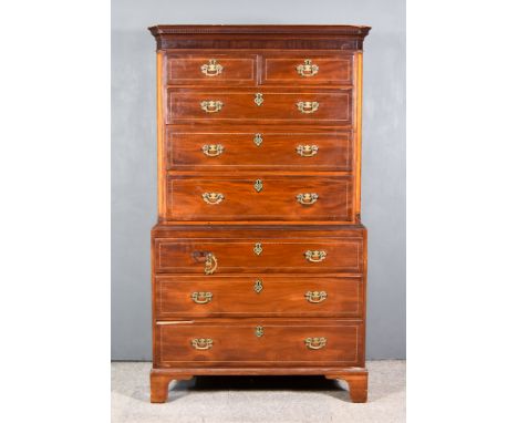 A George III Mahogany Tallboy, the upper part with dentil moulded cornice, fitted two short and three long drawers, with sati