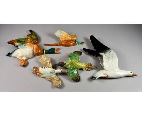 A Set of Three Beswick Flying Pheasants, No.s 661/1-661/3, a flying mallard duck No.596/1, and three other flying models, var