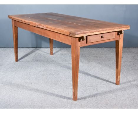 A 19th Century French Provincial Cherry Wood Kitchen Table, with five plank cleated top, draw leaves to both ends, plain frie