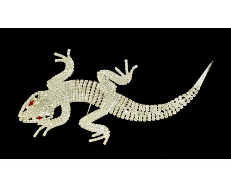A Vintage Butler &amp; Wilson Gecko Brooch, an articulated gecko/lizard brooch with red eyes, 75mm x 190mm, signedThe item pr