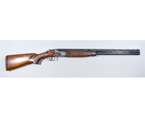 A 12 Bore Over and Under Shotgun, by Lanber, 28ins blued steel barrel with elevated top rib, bright steel action bearing make
