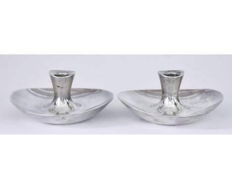 A Pair of Finnish Silver Pillar Candlesticks, designed by Tapio Wirkkala, Suomen Hopeateollisuus Oy, Helsinki 1957, of stylis