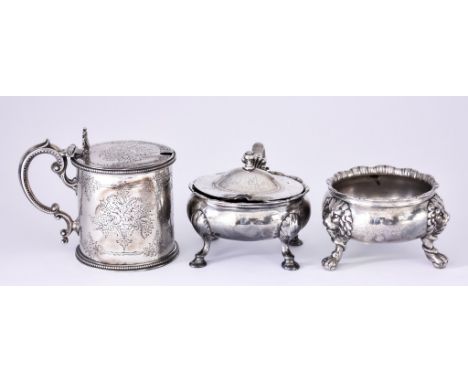 A George II Silver Circular Salt and Two Mustard Pots, the salt by Edward Wood, London 1746, with shaped and reeded rim, on t