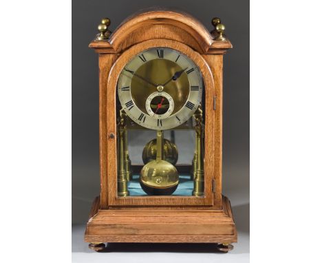 A Late 19th Century Oak Cased Timepiece, the 6.5ins silvered chapter ring with Roman numerals, subsidiary seconds dial with a