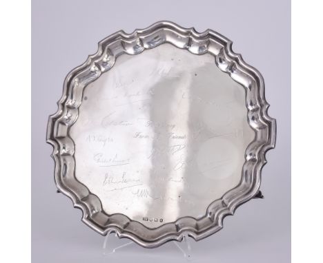 An Elizabeth II Silver Circular Salver, by Viners Ltd., Sheffield 1965, with shaped and moulded rim, presentation inscription