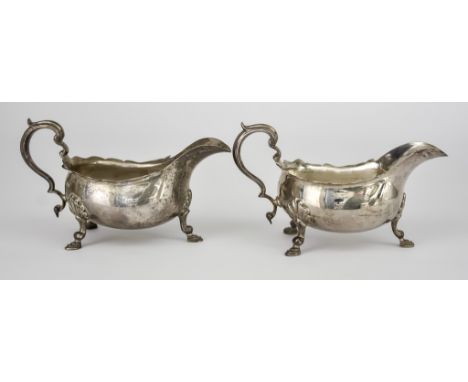 A Pair of George V Silver Oval Sauce Boats, by the Goldsmiths &amp; Silversmiths Company, London 1928, with shaped rims, scro