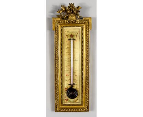 A French Carved Giltwood Thermometer, Late 19th Century, the glass bulb and capillary tube filled with coloured alcohol, with