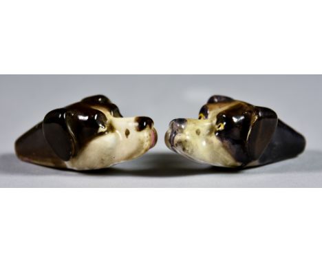 Two Royal Worcester Porcelain Hound Head Dog Whistles, 1897, each naturalistically modelled and painted, factory marks, 2ins 