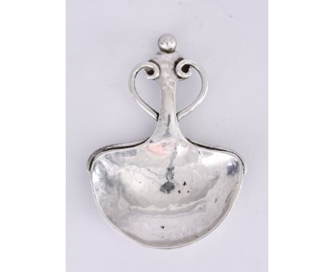 A George V Arts &amp; Crafts Silver Caddy Spoon, by A.&nbsp;E. Jones, Birmingham 1923, with planished finish, the handle with