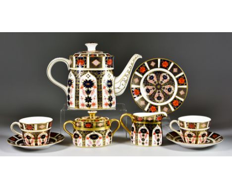 A Royal Crown Derby Bone China Old Imari Pattern 1128 Part&nbsp; 'Married' Tea Service, comprising - teapot and cover, 7.25in