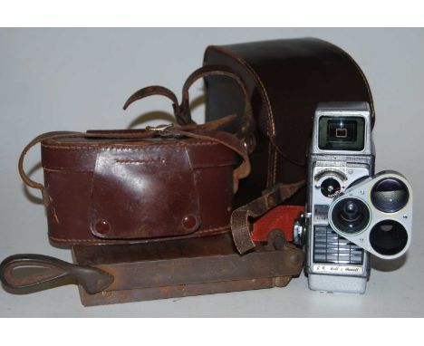 A Bell &amp; Howell Autoset turret 8mm cine camera in fitted leather case with instruction manual, together with a Purma Spec