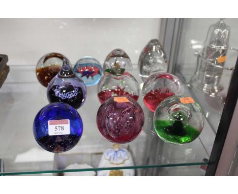 A collection of modern glass paperweights to include Caithness (10)