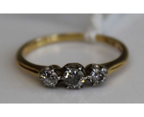 An 18ct gold diamond three-stone ring 1.9g size K/L