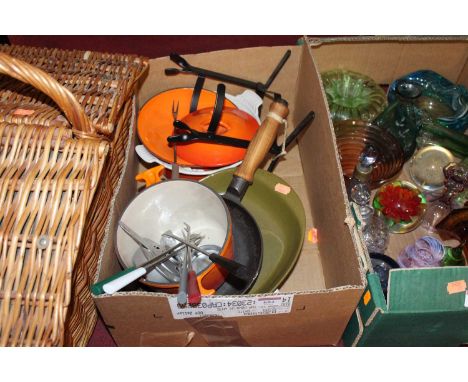 A collection of Le Creuset enamel and ceramic kitchenwares