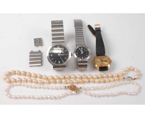 A ladies Tissot gilt metal cased wristwatch, having a signed champagne dial with baton markers and steel back numbered 24363 