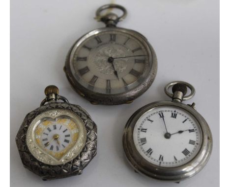 A continental silver ladies pocket watch having a heart shaped white enamel and gilded dial, engine turned and enamel inset b