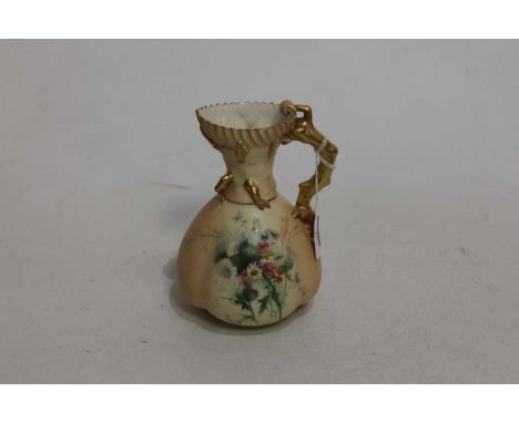 A circa 1900 Royal Worcester blush ivory jug, having shot enamelled floral decoration and gilt naturalistic handle, shape No.