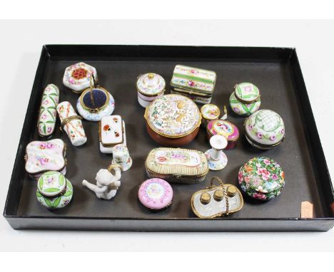 A collection of various enamelled pill and patch boxes, to include Limoges