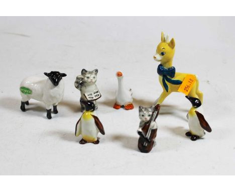 A Beswick figure of a black-faced lamb; together with a Beswick Babycham figure etc (7)Condition report: Penguins – both craz