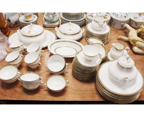 A Royal Doulton 'Clarendon' pattern part dinner serviceCondition report: Some light rubbing throughout.Some cutlery marks to 