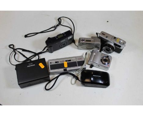 A collection of various cameras to include Minox