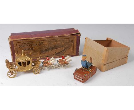 A German Gescha Express tin plate clockwork luggage porter and trunk, in card outer box, together with a Johillco Series Mini
