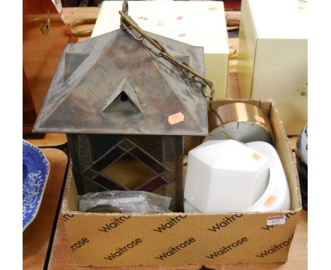 A 20th century copper hanging stained glass lantern, together with a 20th century Metamec mantel clock and two milk glass sha