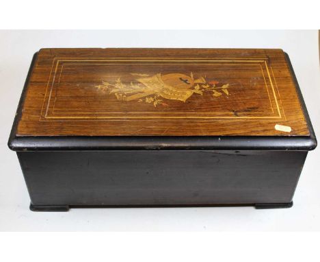 A late 19th century faux rosewood cased Swiss music box, having a 9" cylinder playing eight airsCondition report: Comb with s