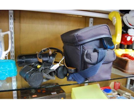 A cased pair of binoculars; together with a late 20th century video recorder