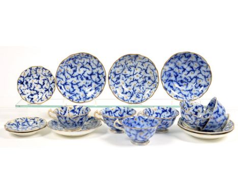 A VICTORIAN FLOW BLUE AND GILT TEA SERVICE, C1860