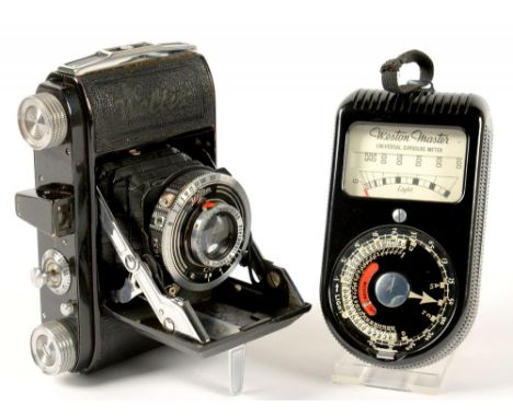 A WELTA 35MM FOLDING CAMERA WITH CASSAR F2.9 5CM LENS AND A WESTON MASTER LIGHT METER