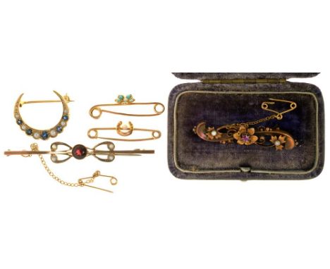 FIVE VICTORIAN BROOCHES COMPRISING A SAPPHIRE AND PEARL CRESCENT BROOCH IN GOLD, A RUBY AND PEARL FLOWER BROOCH IN 15CT GOLD,