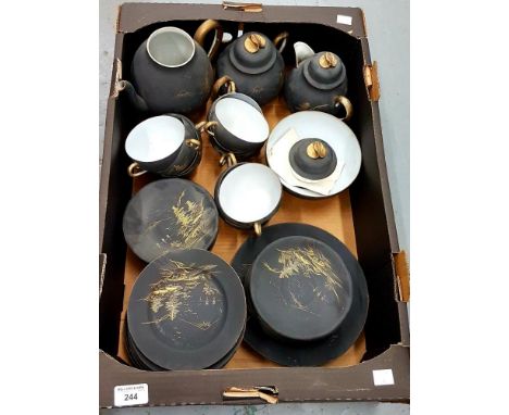 A JAPANESE BLACK GROUND EGGSHELL PORCELAIN TEA SERVICE 