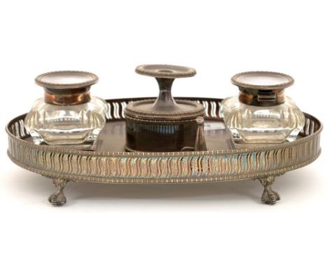 A VICTORIAN OVAL EPNS GALLERY INKSTAND WITH TAPER STICK, WAFER COMPARTMENT AND TWO CUT GLASS INKWELLS, 29 CM W, C1860++TAPER 