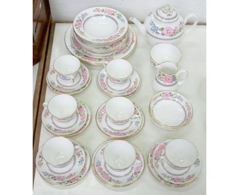 A ROYAL WORCESTER FLORAL TEA SERVICE, BLACK PRINTED MARK 