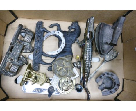 A mixed collection of metal ware  items to include alligator nut cracker, ornamental figures , horse brasses etc 