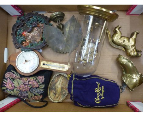 A mixed collection of items to include A brass Nutcracker in dog form, brass Anniversary Clock, Indian Brass Peacock etc (1 t