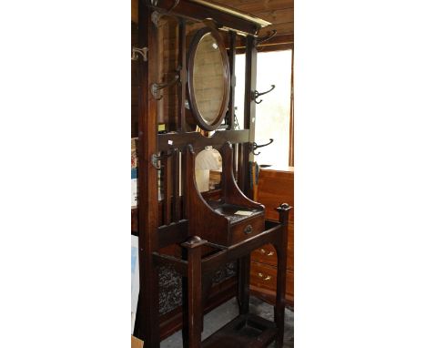 Large hall coat stand with draw and central mirror.&nbsp;