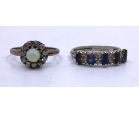 Two 18ct Gold rings.  To include an 18ct Yellow Gold Round Cabochon Opal and Old European Cut Diamond ring and an 18ct White 