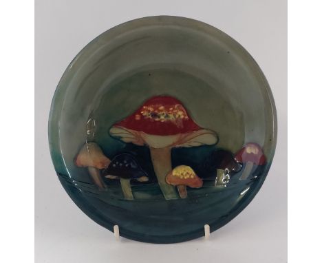 A Moorcroft Claremont shallow dish, C1915 with WM Blue signature, measures 19cm in diameter , impressed Moorcroft made in Eng