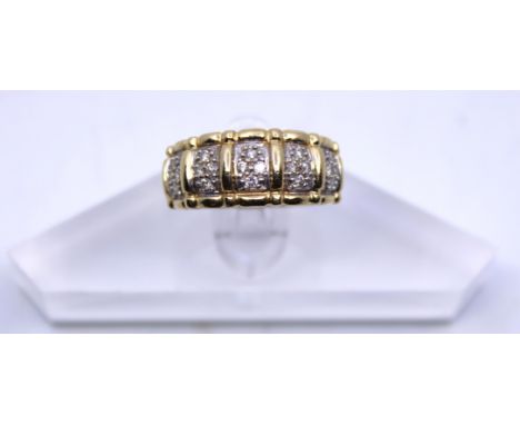 14ct Yellow Gold 0.25ct total Diamond Dress ring.  The ring is hallmarked '585' for 14ct Gold, 'DIA' for Diamond and '0.25' f