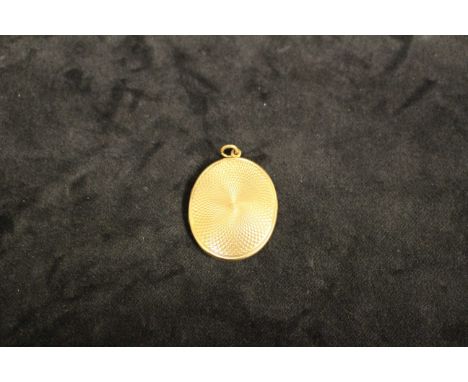 15ct Gold Oval engine turned locket. Engraved inside "Clive from Violet August 25th 1917". Painting of elegant lady inside.  