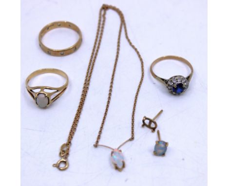 Selection of 9ct Gold Jewellery.  To include a 9ct Gold Oval Cabochon Opal ring, a 9ct Gold Blue & Colourless Stone Dress rin