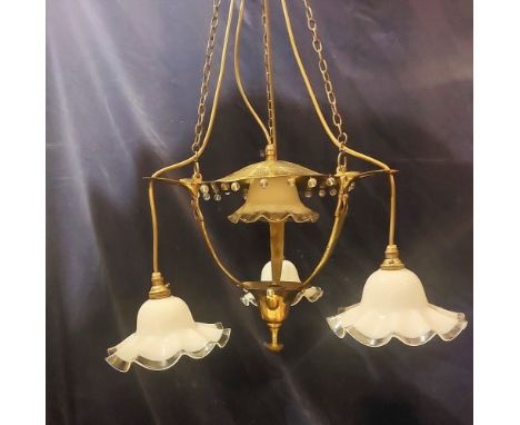An unusual Arts and Crafts ceiling light with 4 milk glass and clear edged shades ,in the Benson Style with glass bead drople