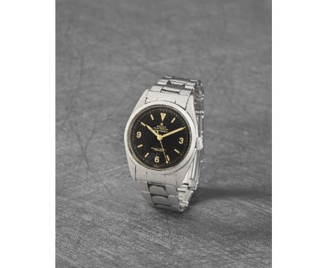 Rolex. A fine and rare stainless steel automatic bracelet watch with gilt honeycomb dial offered on behalf of the family of t