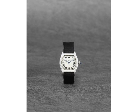Cartier. A lady's rare and early platinum and gold manual wind wristwatchModel: TortueDate: Circa 1920Movement: Jewelled manu